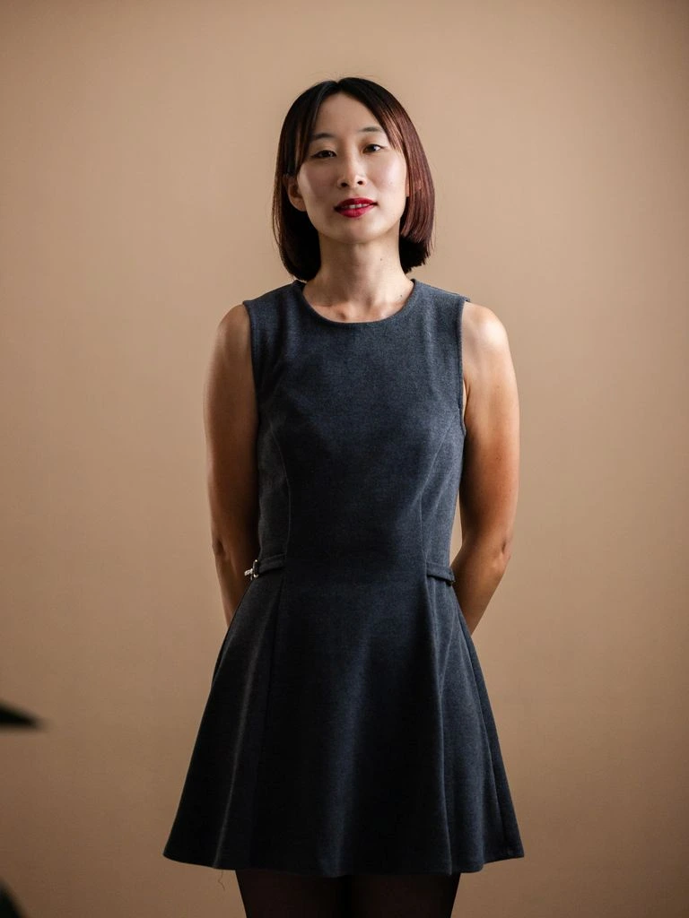 Linda Park, founder of FlowerShopDeals, in her Austin flower studio