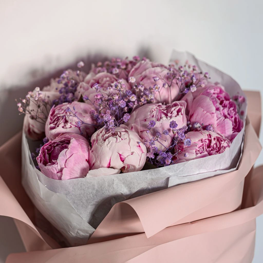 A romantic blush anniversary bouquet of peonies and hydrangea
